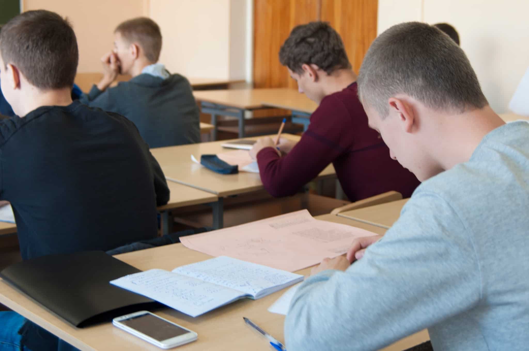 Students sitting at desks in a classroom